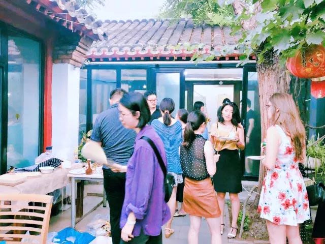 Group of people in a courtyard 