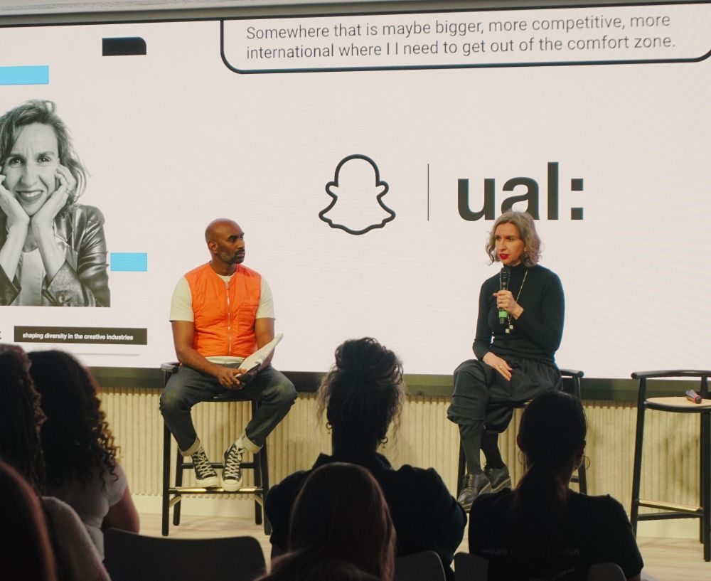 Hosts talking at Creative Shift event