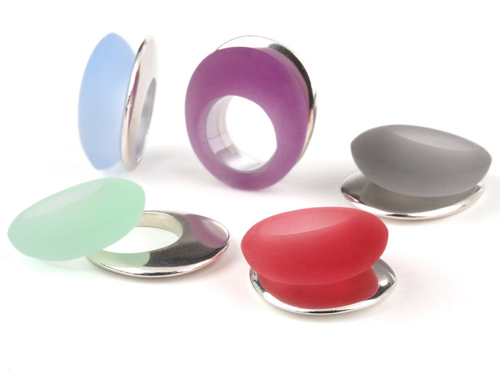 Sarah King's jewellery design, silver and coloured shape rings.