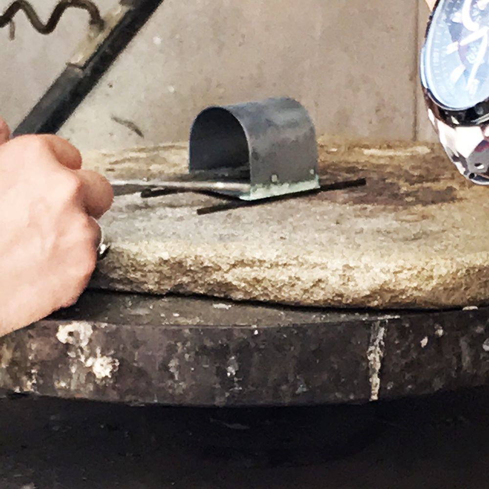 Shaped silver ready to be heated.