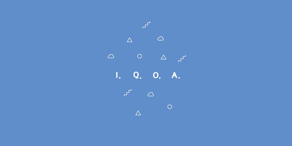 A light  blue background with triangles and circles placed in the middle next to the text 'IQOA'