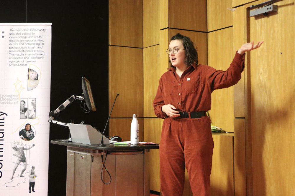 female speaker in lecture theatre