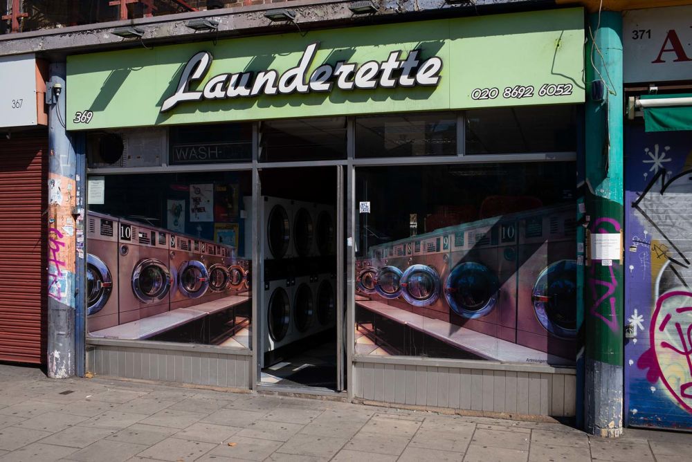 a shop front of a launderette 