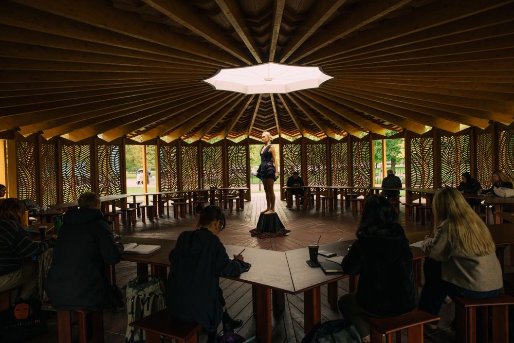 Model posing under a sky light