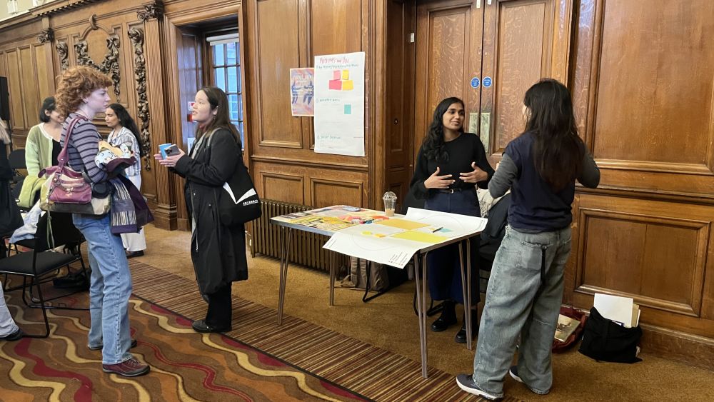 People sitting around a table and talking