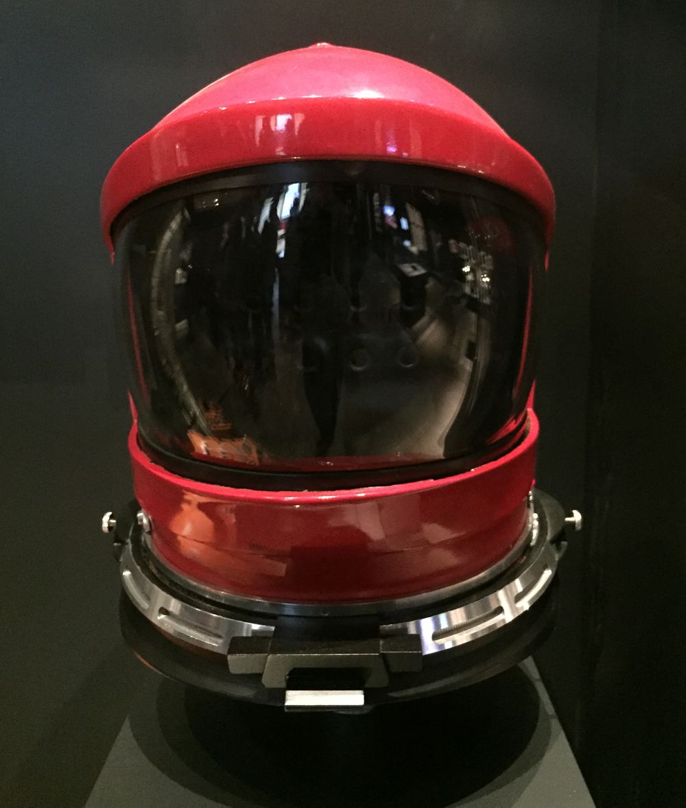 An image of a red space helmet