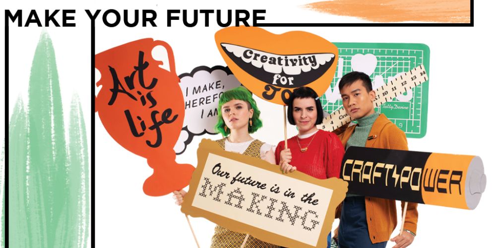 Three people holding placards against backdrop with Make Your Future written