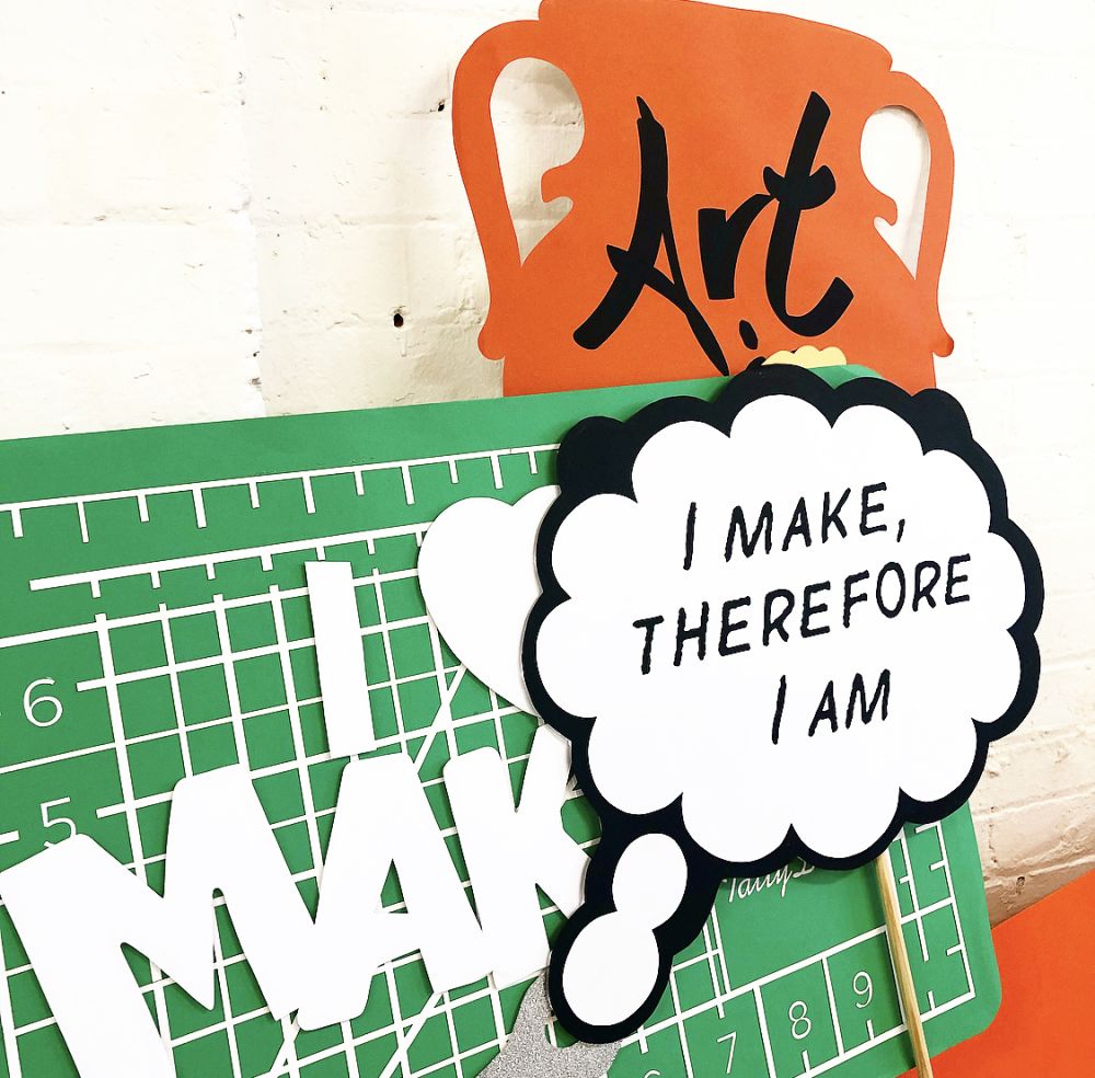 Props for a campaign including large thought bubble declaring I Make Therefore I Am