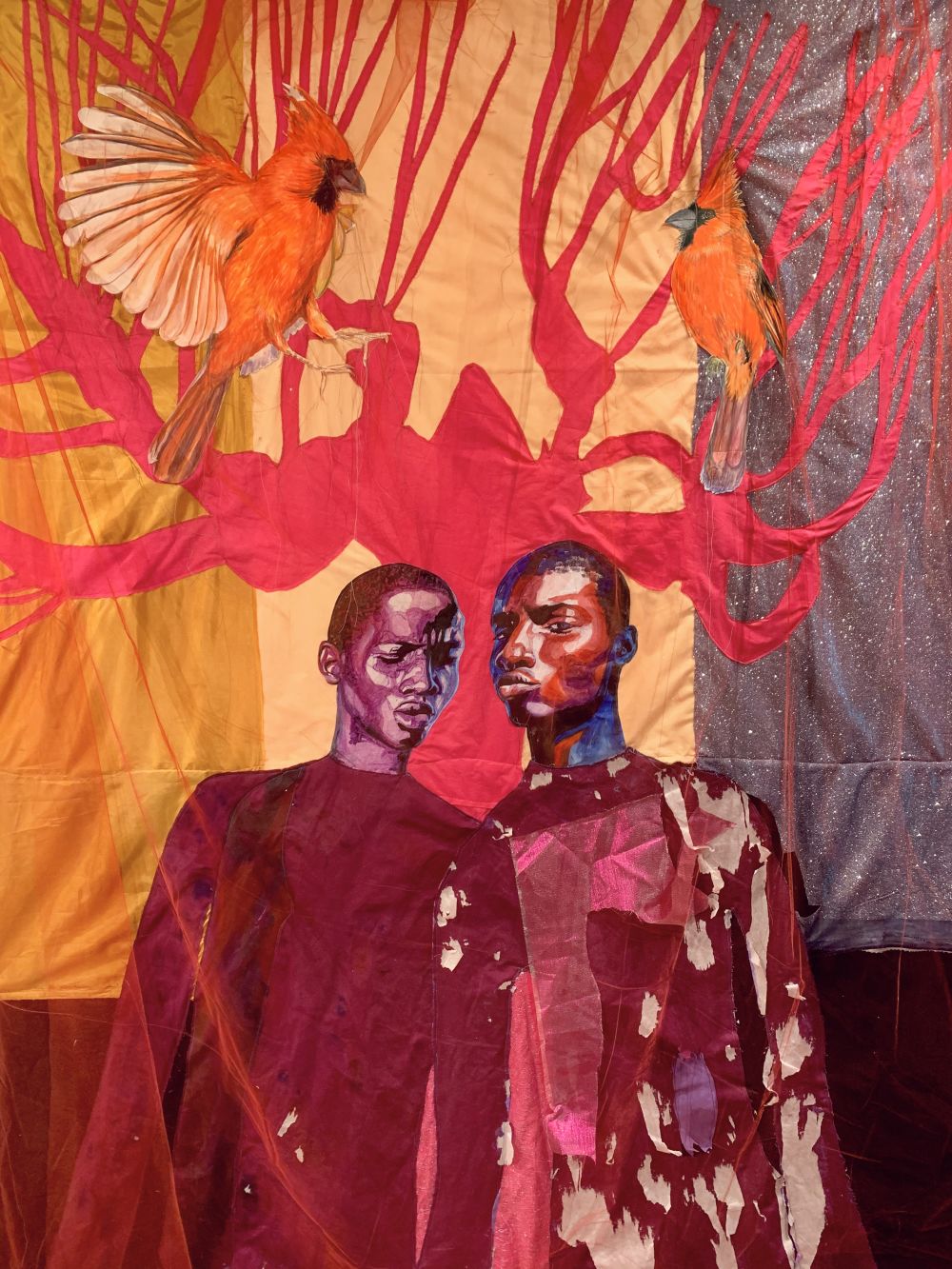 Artwork by Liana Ambrose-Murray of two figures in red on fabric
