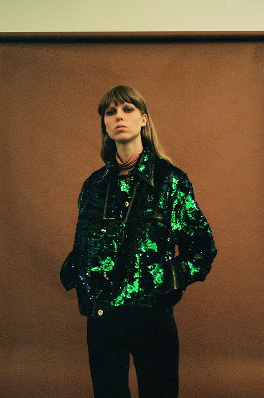 Model wearing an outfit from brand HEW