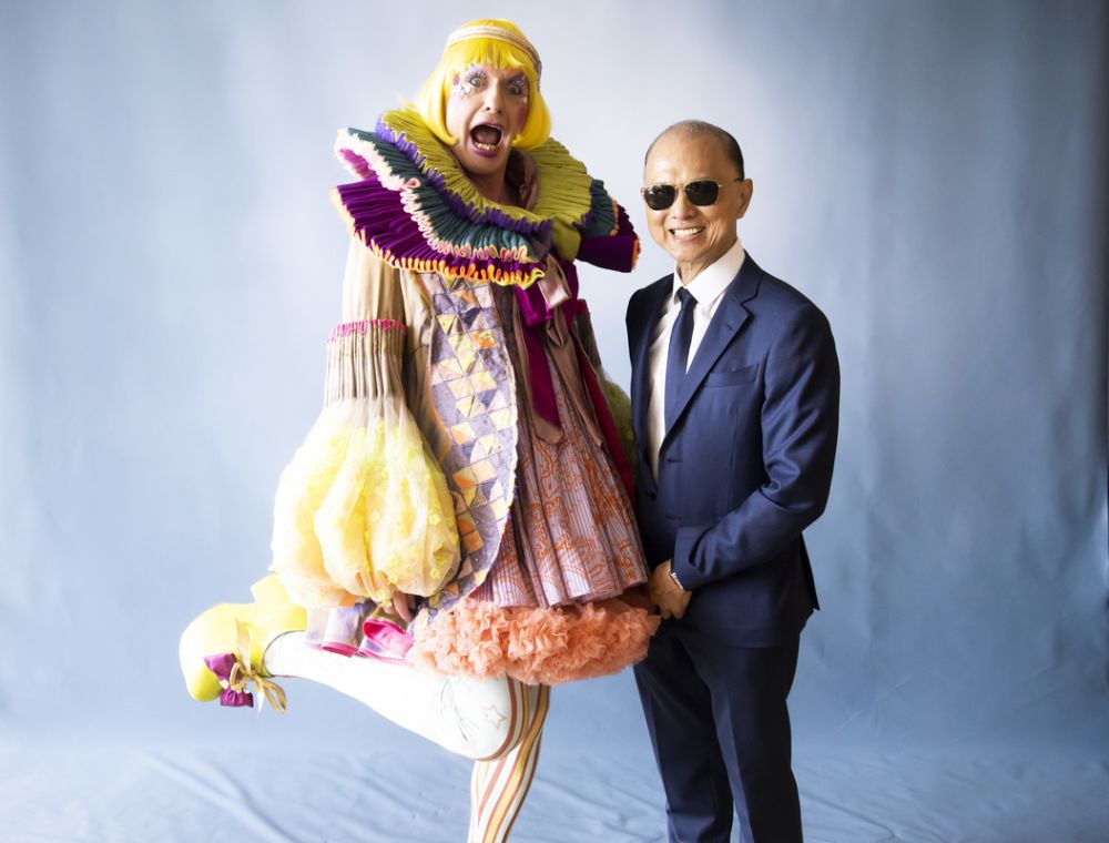 Grayson Perry and Jimmy choo posing for a photograph