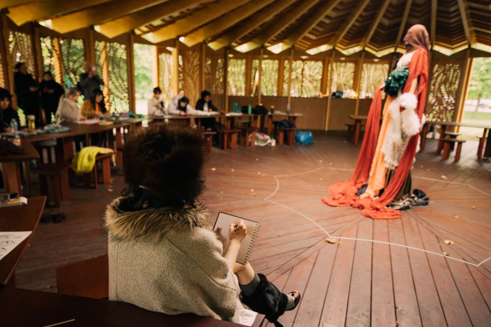 Students interacting with model