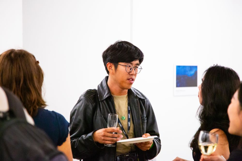 Students gathered in the gallery area