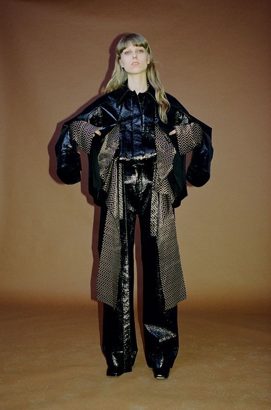 Model wearing an outfit from brand HEW