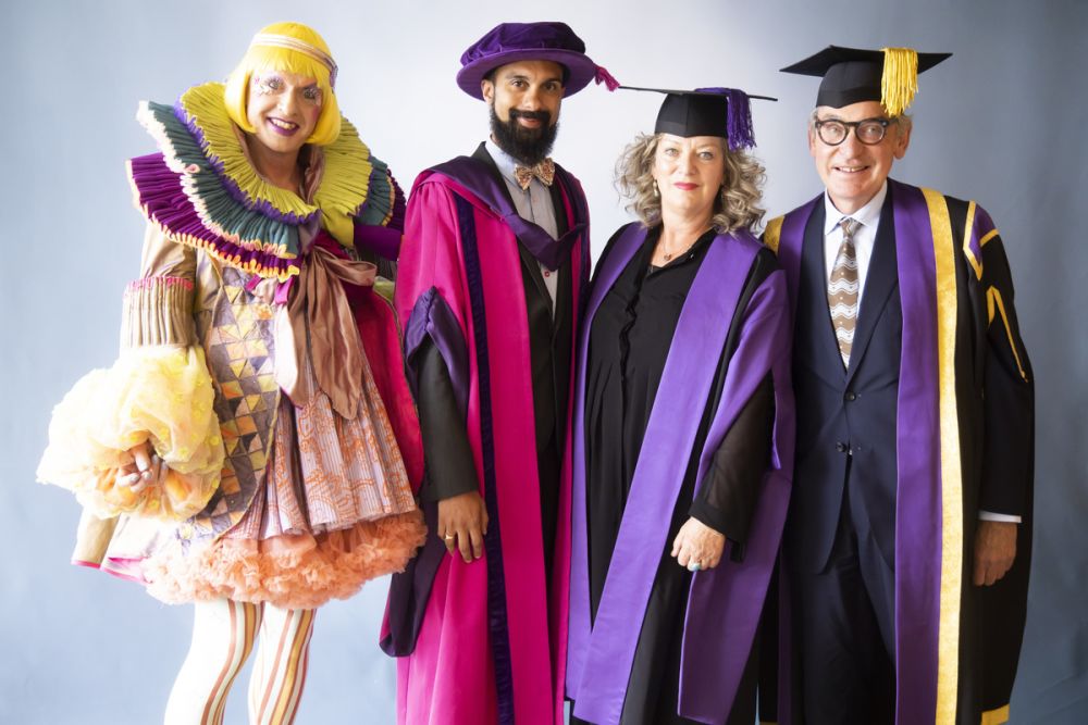 Grayson Perry posing with the Chancellors
