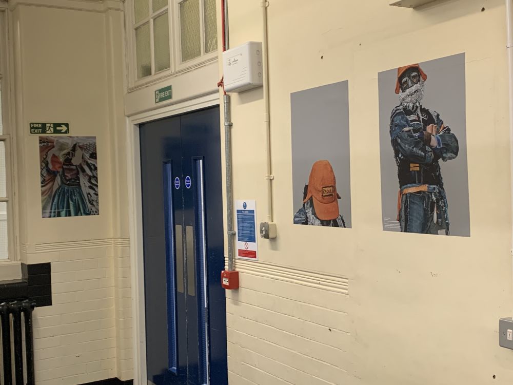 Vinyls of students work placed on walls at Curtain Road