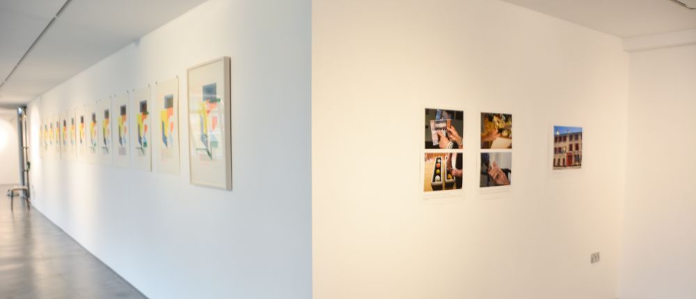 photos hung on a gallery wall