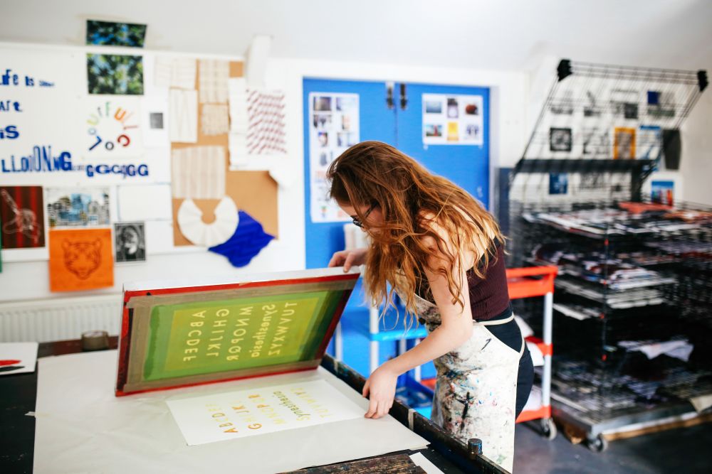 Student and tutor in the printmaking studio