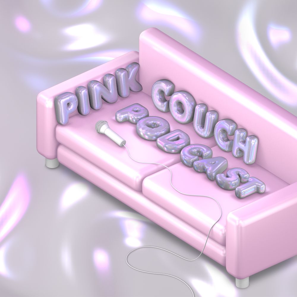 Microphone lying on pink couch for 'Pick Couch Podcast'.