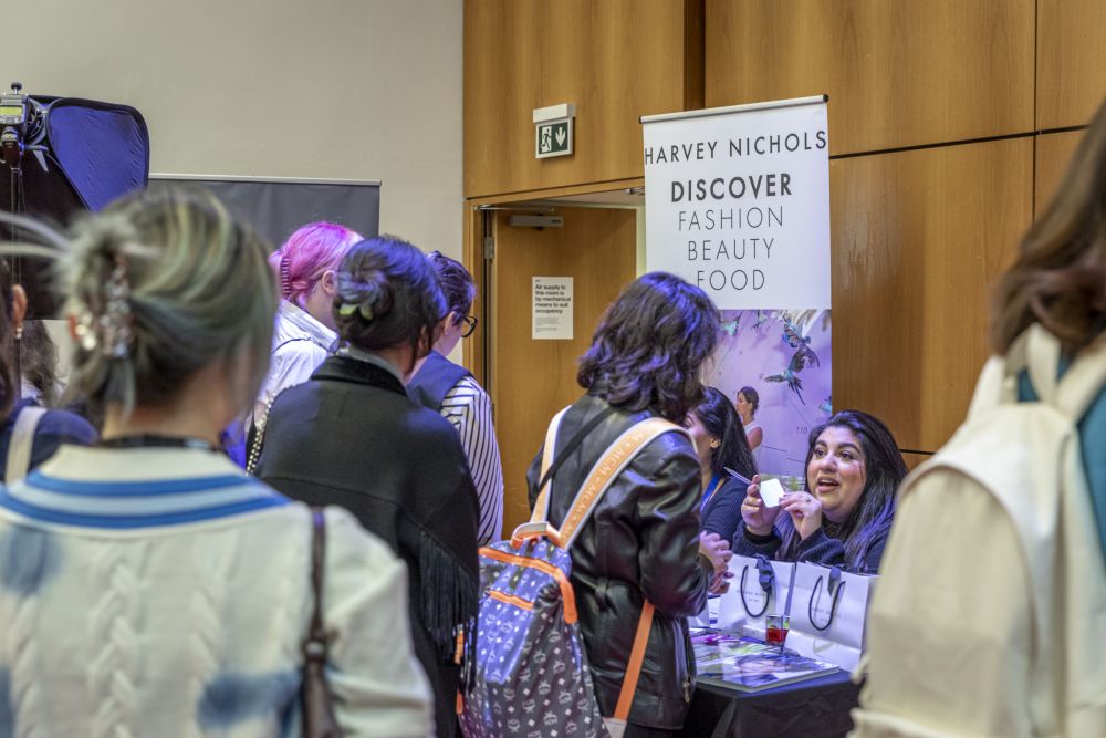 Students meeting Harvey Nichols at the careers fair