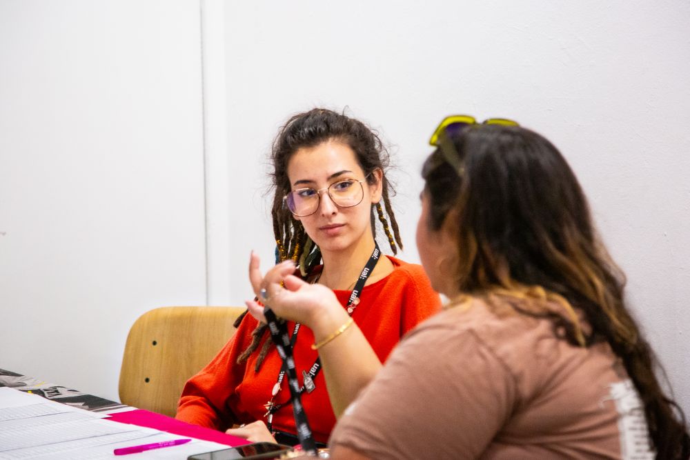 SU Sabbatical Officer at the ticketing desk