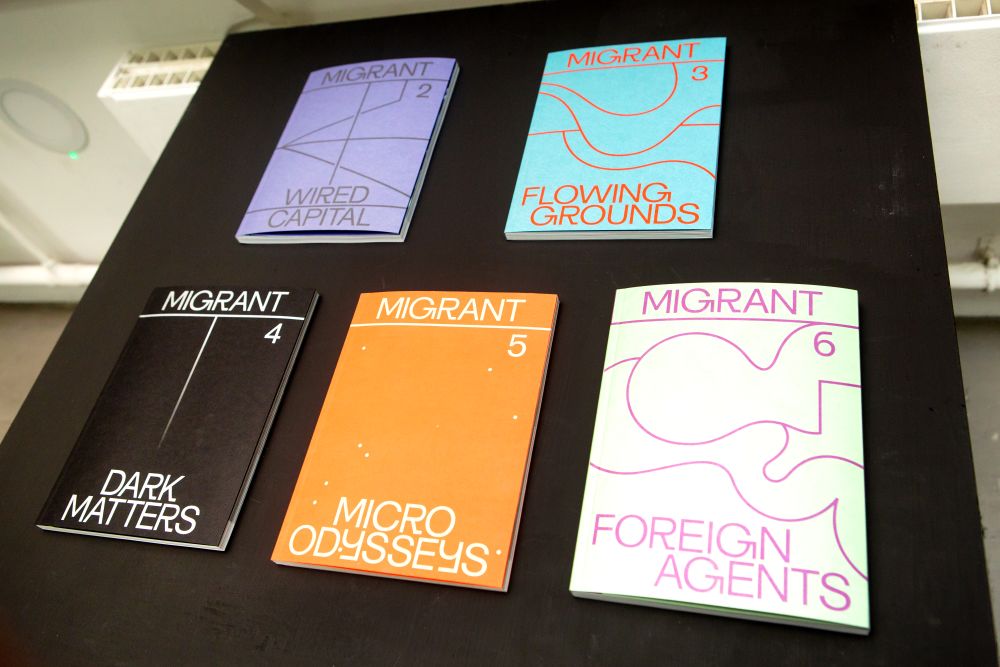 A selection of publications called Migrant and their front covers