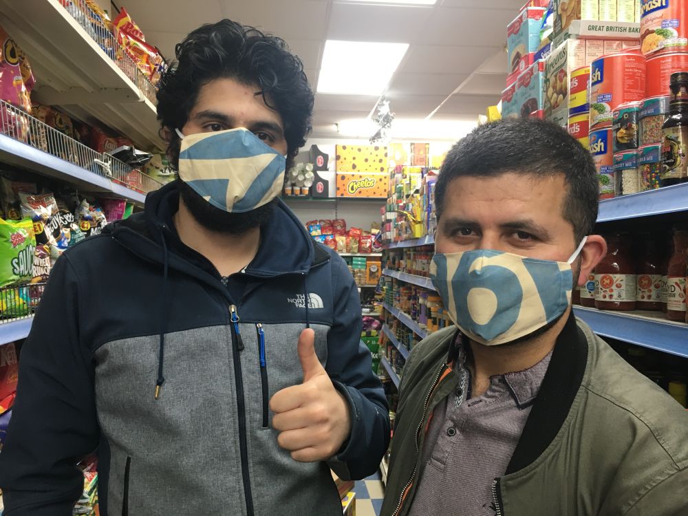 Two men in facemasks