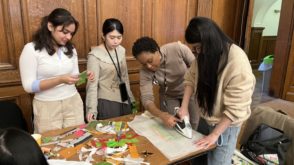 People crafting around a table