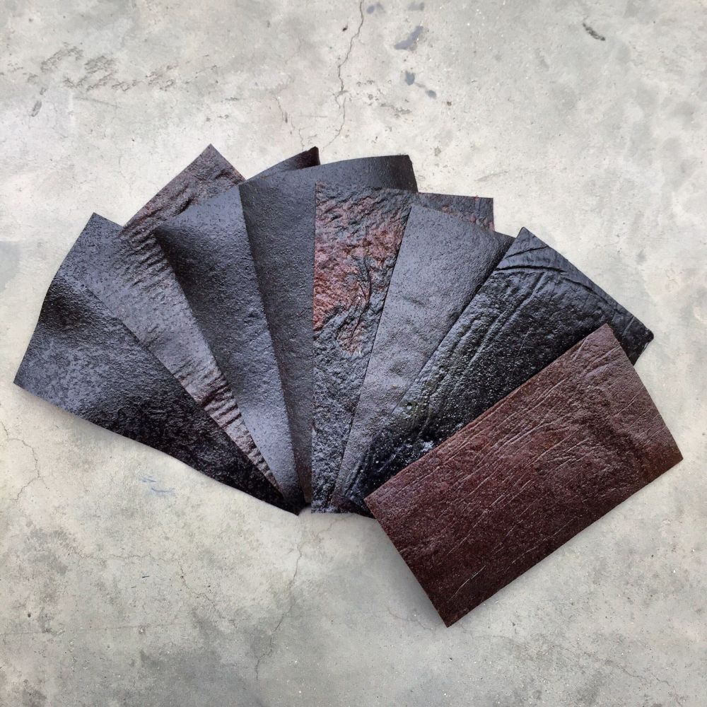 A selection of swatches of a material that resembles leather