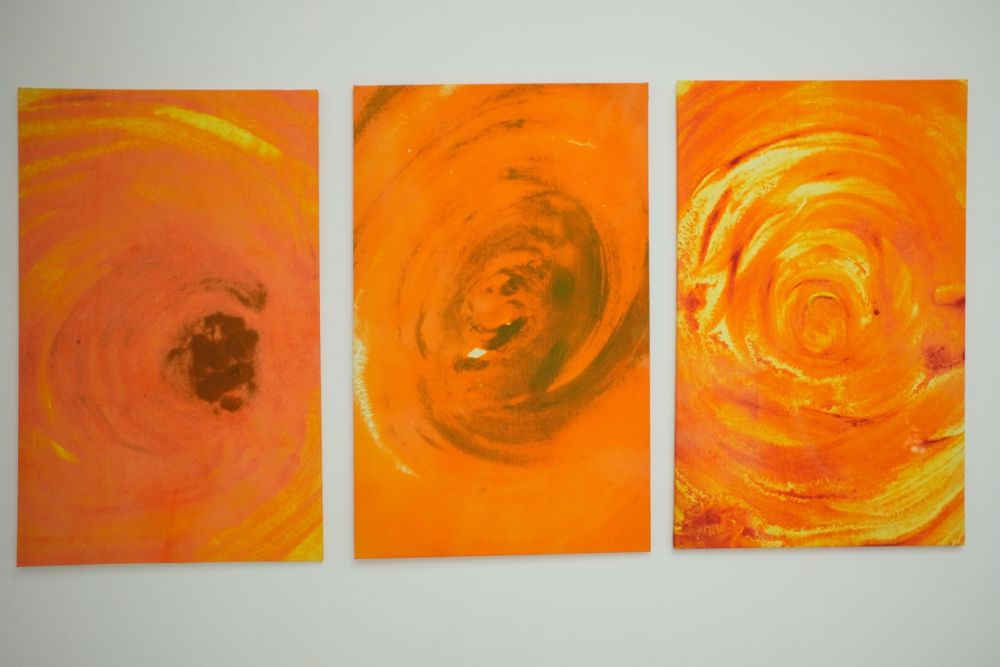 abstract painting of orange circles