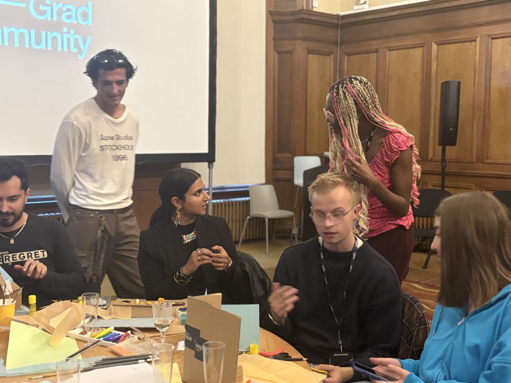 People sitting around a table and talking