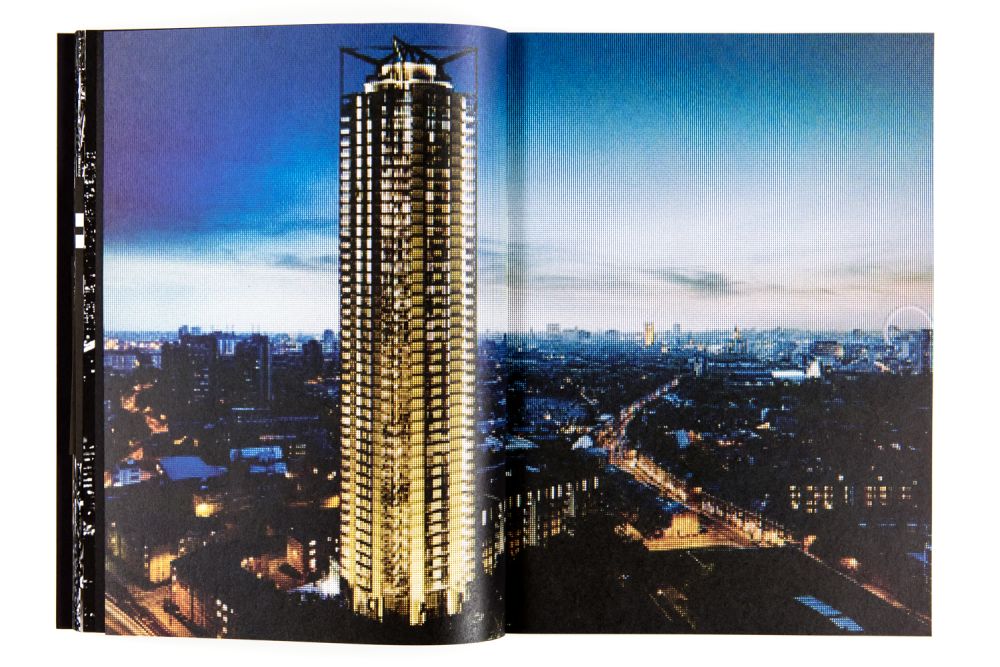 Pages of Metropole book showing London high-rise at night