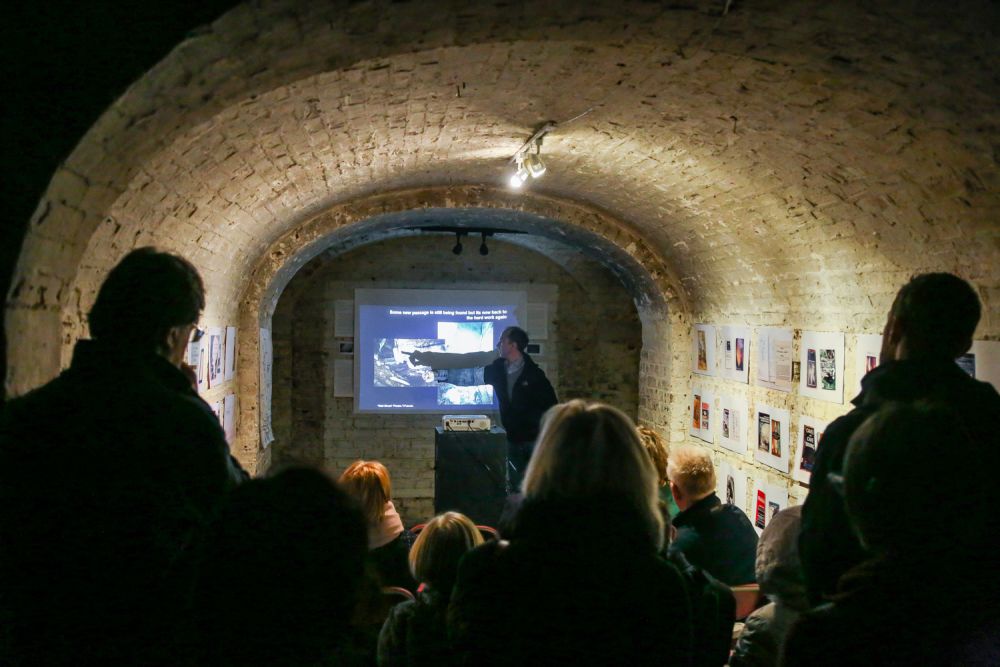 Students attend a talk in the Crypt gallery
