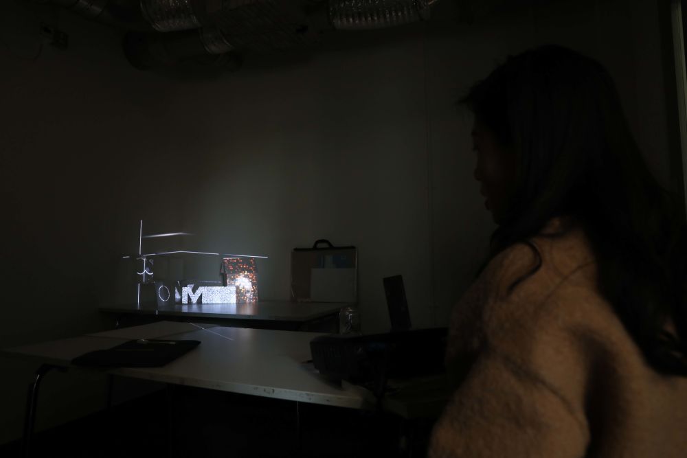 Student working in LCC's Creative Technology Lab on Projection Mapping