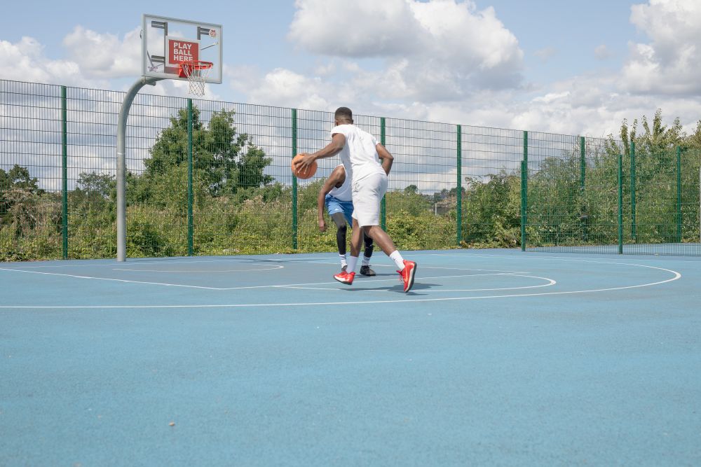 basketball player on blue court