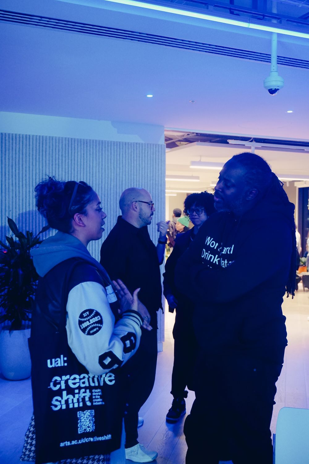 People talking at an event 