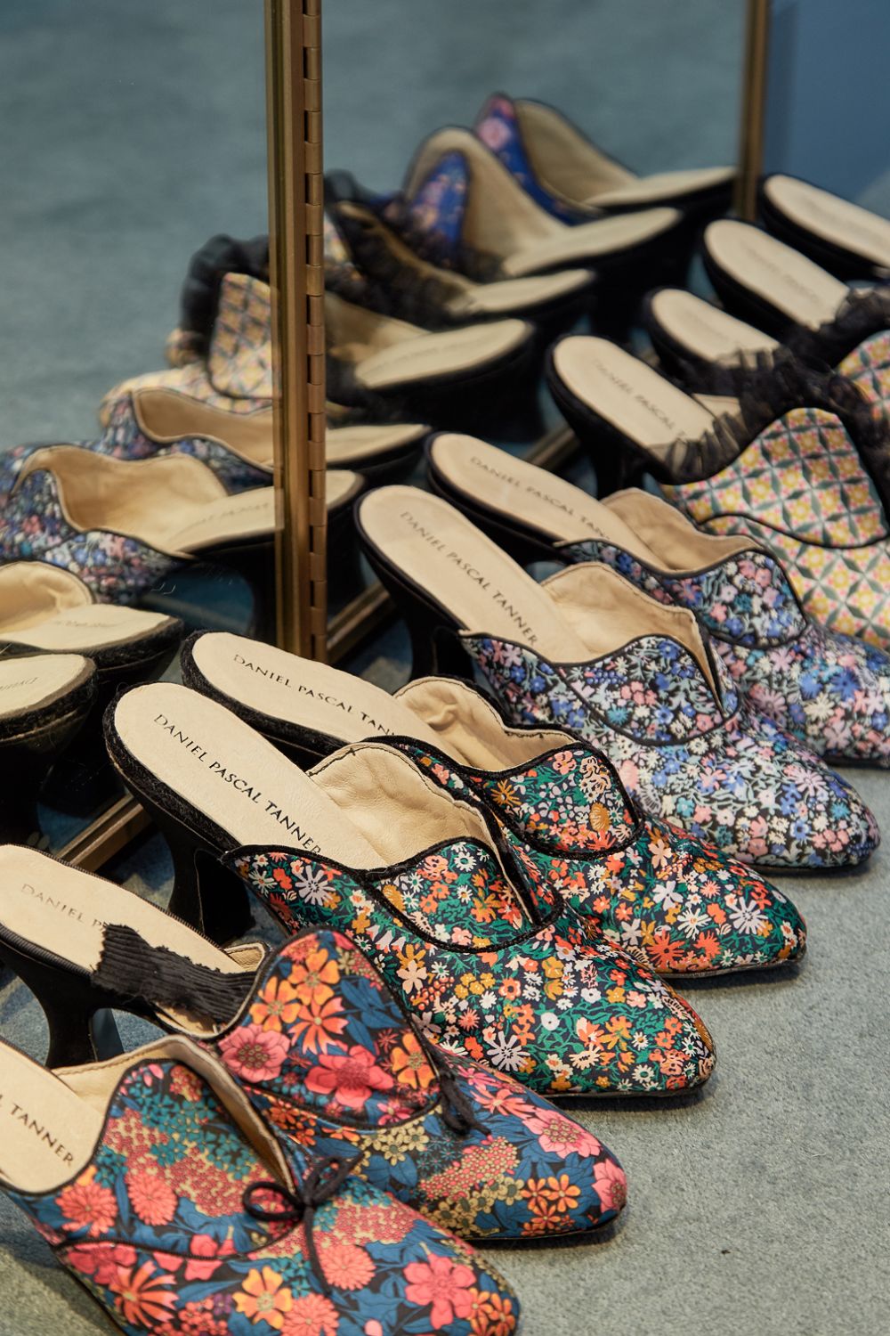 Line up of shoes with Liberty print by Daniel Pascal Tanner