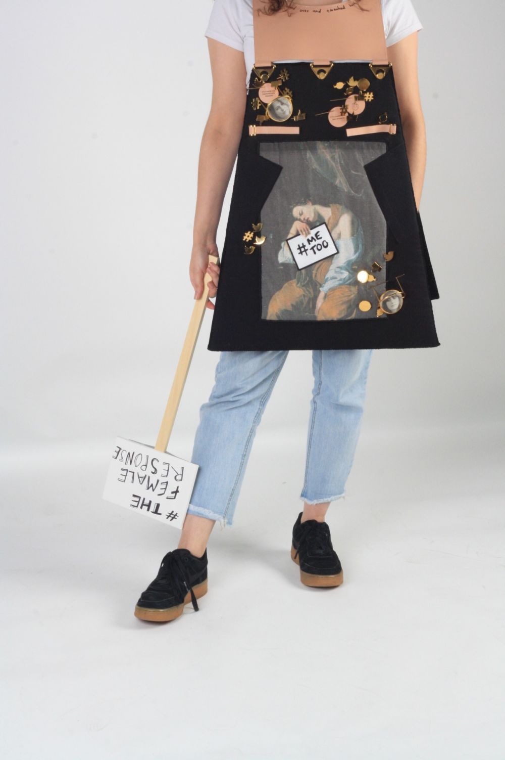 model wearing skirt which resembles a black billboard