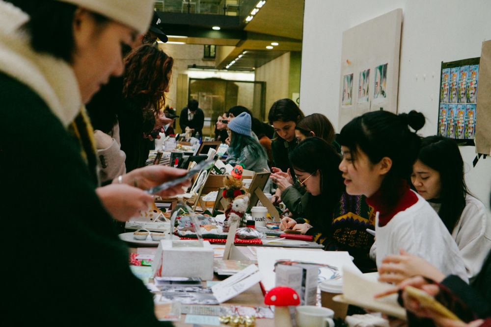 Holiday Market vendors and buyers in The Street CSM