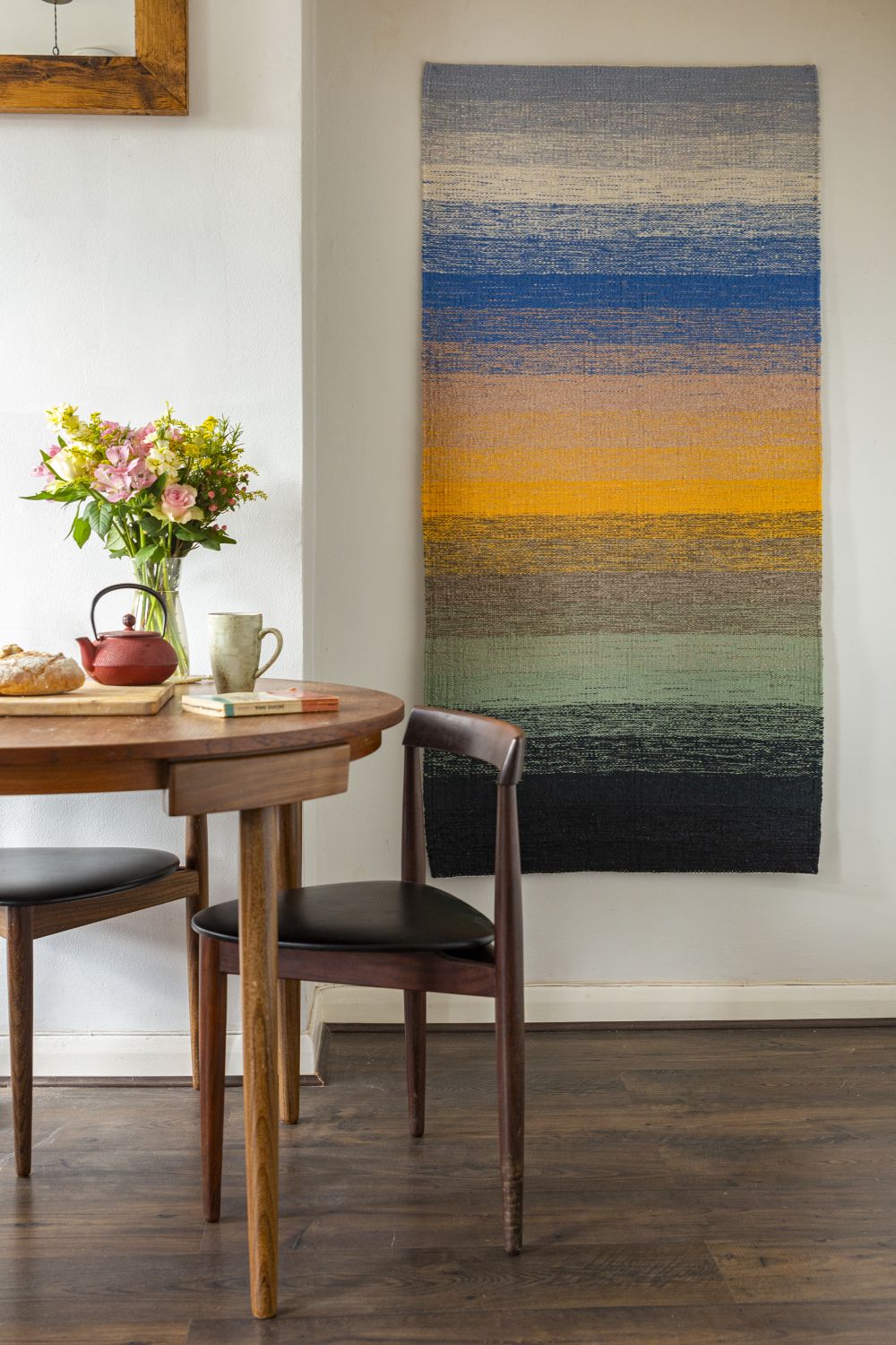 Still life image of weave hung in a modern home