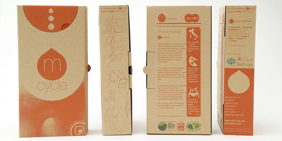 A series of cardboard boxes which has an orange branding across them