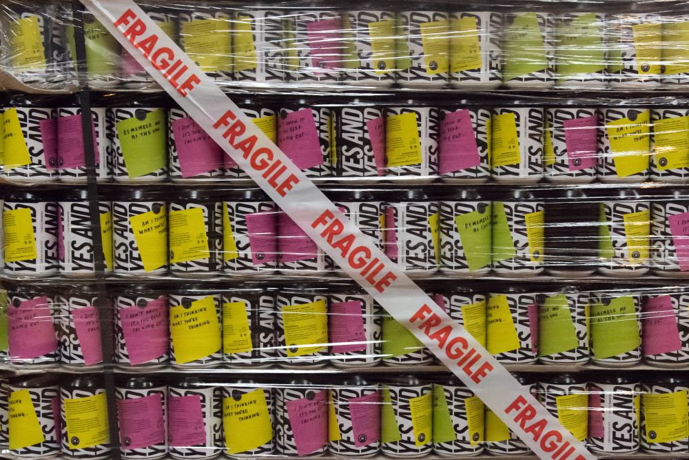 Cans of beer wrapped in plastic