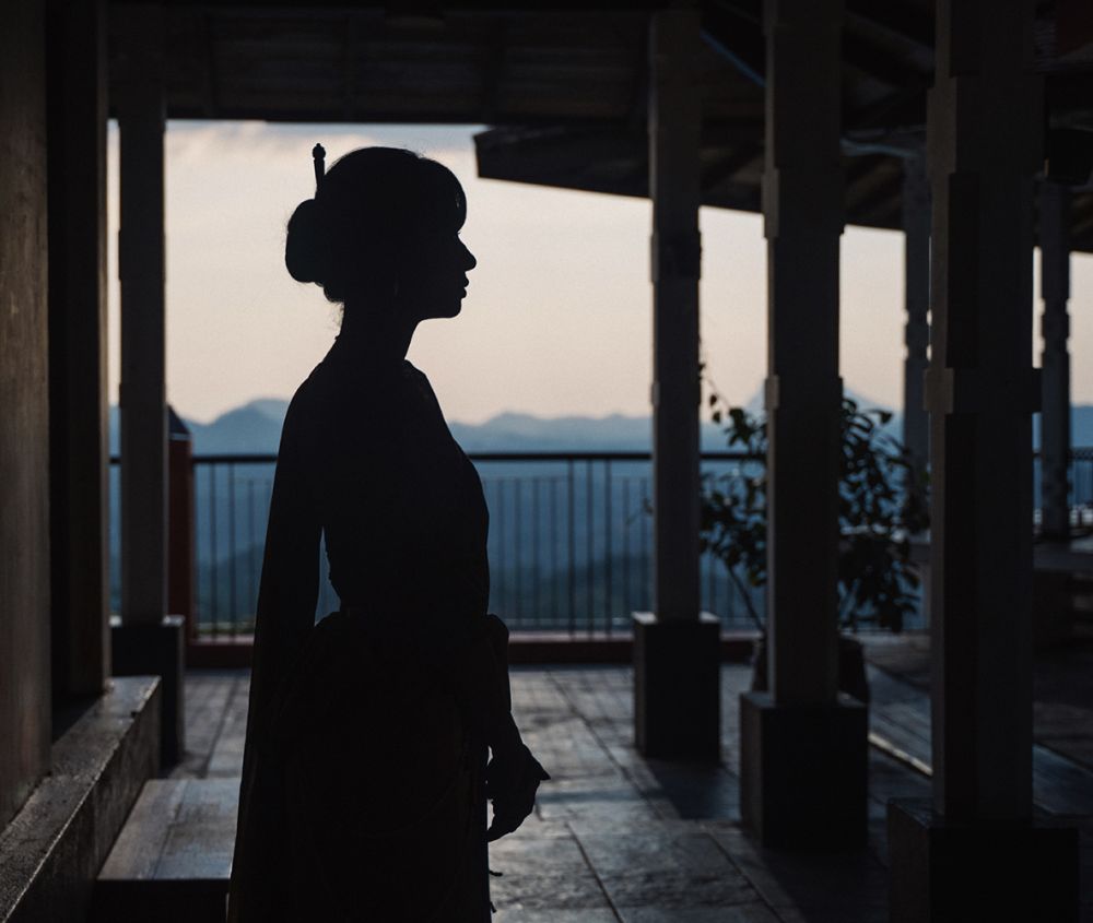 Photograph of silhouetted female model wearing a kimono