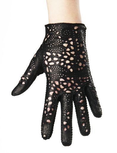 Black leather glove being worn, made by Riina Õun.