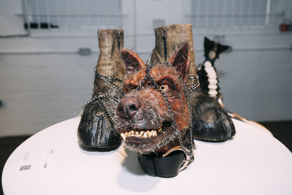 Prosthetic wolf head and hooves with chains