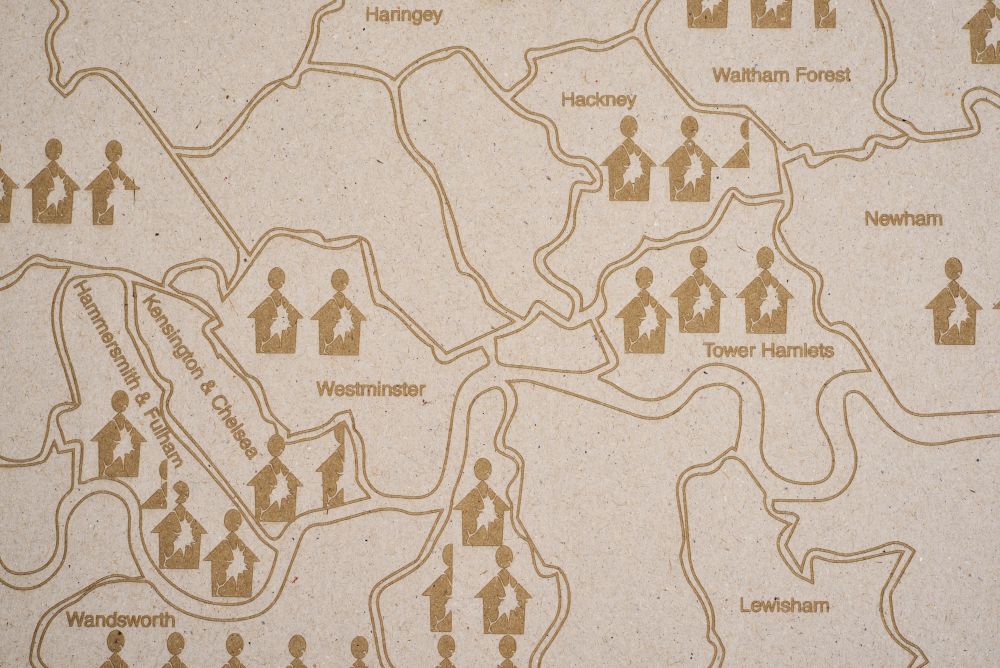 An engraved map of London representing levels of homelessness 