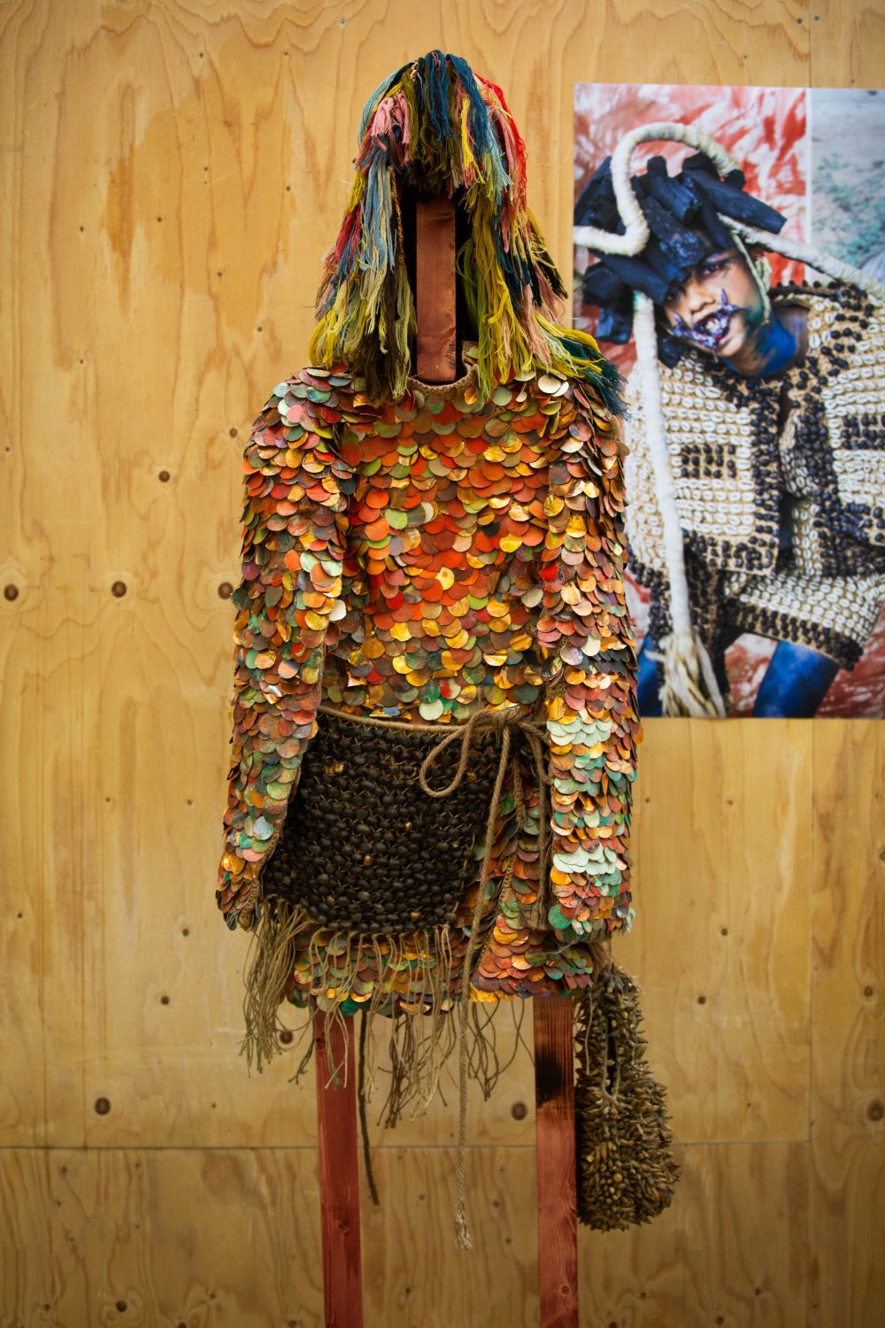 A garment displayed on a wooden hanger