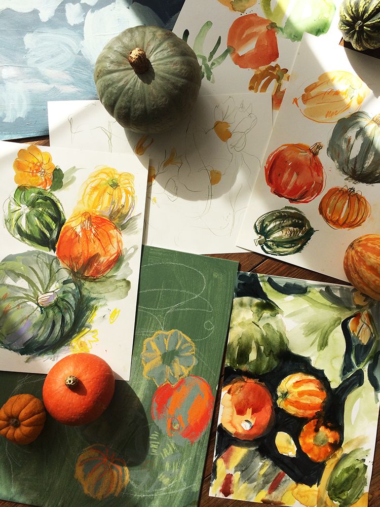 A number of illustrations of pumpkins with produce on table.