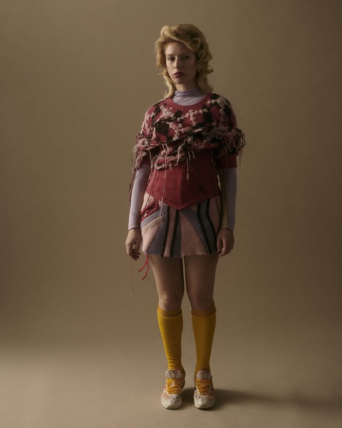 Model wearing positive knitwear