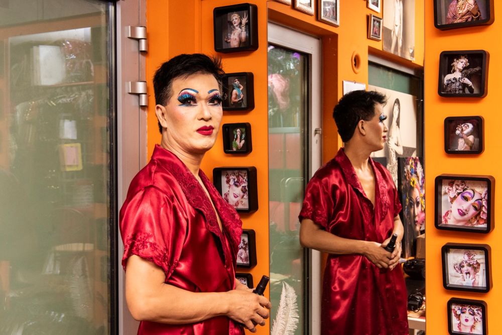 photo of a man wearing makeup